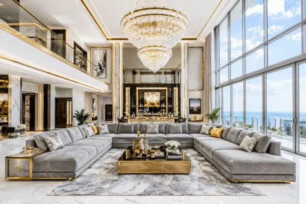 Spacious penthouse living area with a bright ocean view