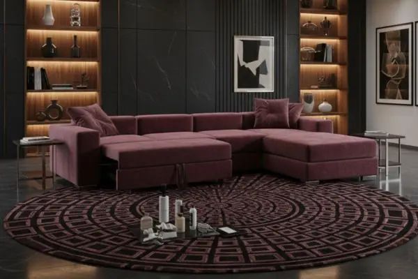 Deep burgundy velvet couch in black slate apartment