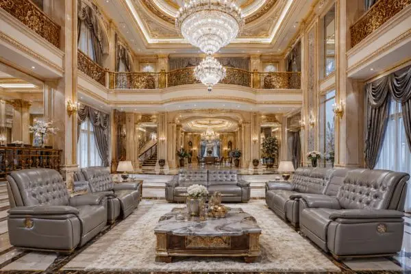 Different types of grey leather sofa recliners in a royal palace living room