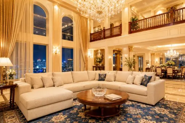 A luxury cream couch showing how to remove common stains from a fabric sofa