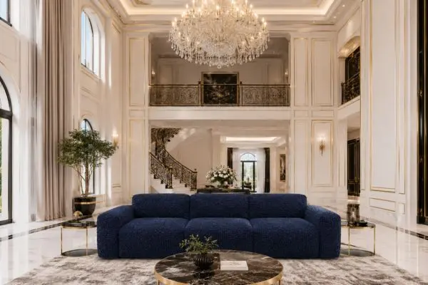 Complete view of a modern navy blue textured couch in a bright luxury palace living room.