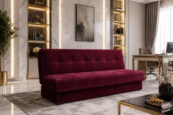 Premium wine red velvet futon sleeper in a luxury corporate home office interior