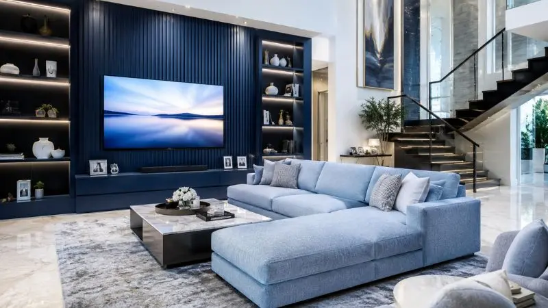 Modern light blue sofa in a luxury living room layout