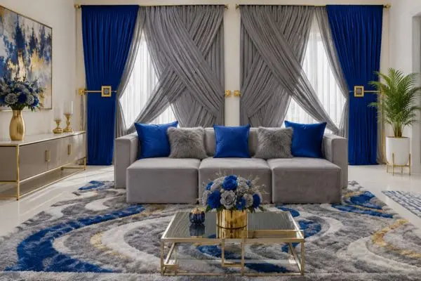 A light gray small modular sofa with three blocks in a royal blue and gray luxury living room.
