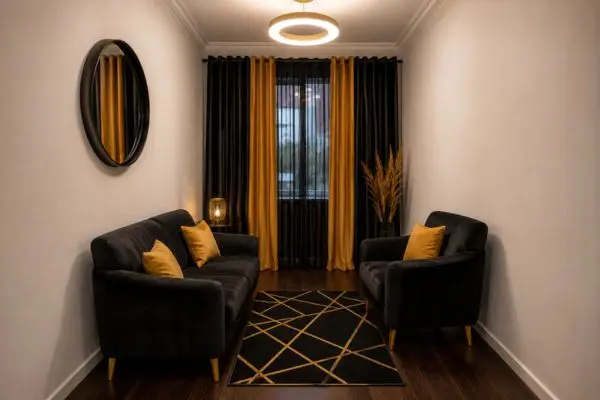 Compact black velvet furniture sets arranged neatly inside a narrow apartment living room layout.