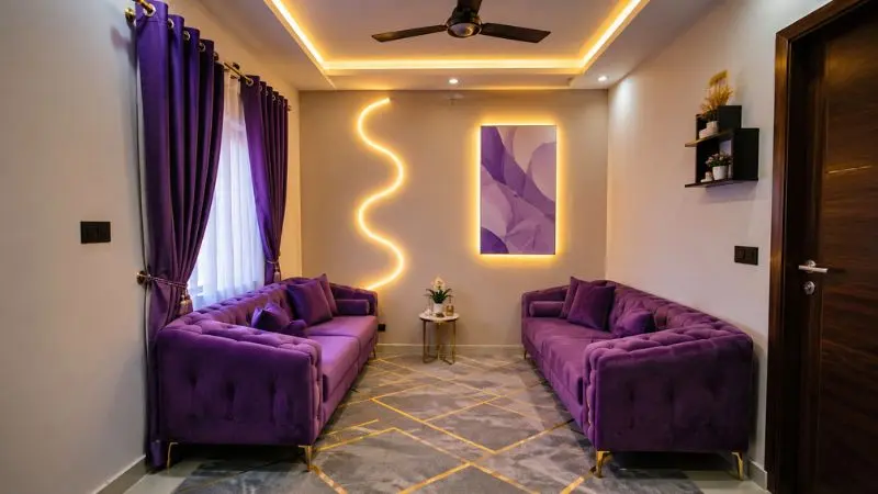 Modern space-saving purple tufted velvet sofas arranged beautifully inside a narrow living room layout.